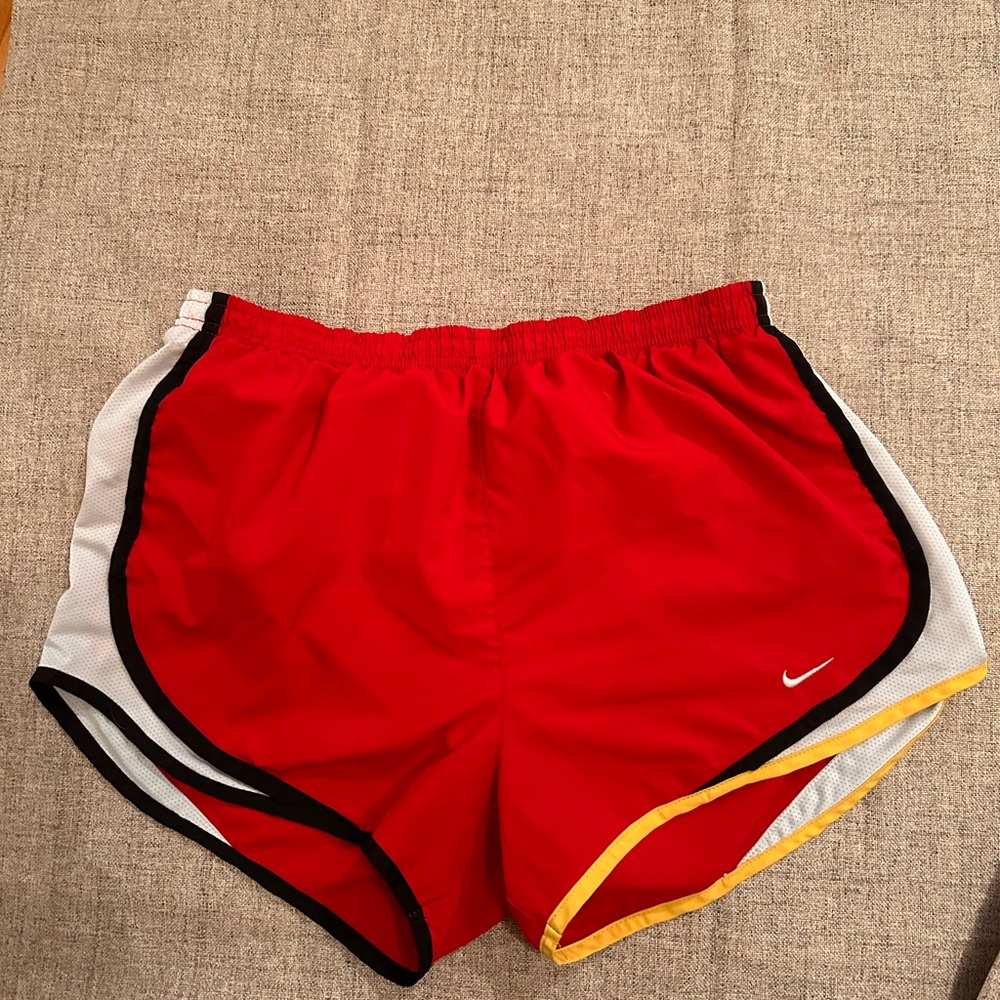 Nike Women's Red Athletic Shorts with Black, White, and Yellow Trim